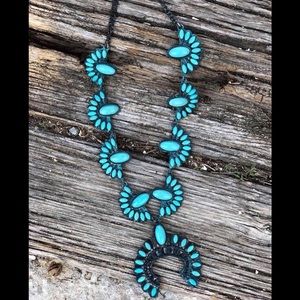 Turquoise Squash Blossom necklace.